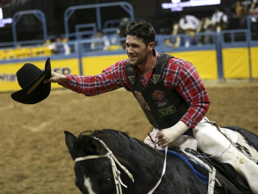 Vastbinder taking a victory lap (on a horse, not a bull) after winning a rodeo event in Las Vegas, 2018.