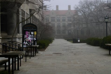 A misty day on a seemingly empty main quad, during UChicagos spring break in 2020, after many students had departed from campus.