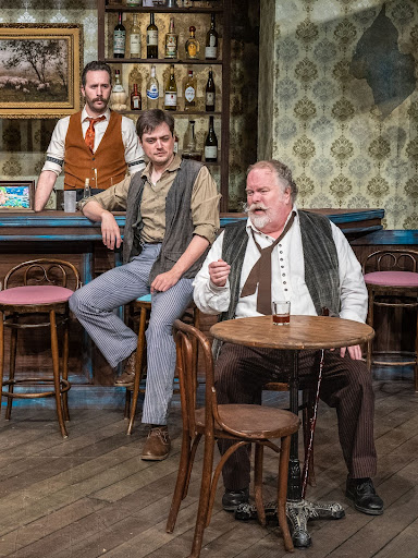(From left to right) Philip C. Matthews as Freddy, Travis Ascione as Picasso, and Dan Deuel as Gaston in Picasso at the Lapin Agile.
