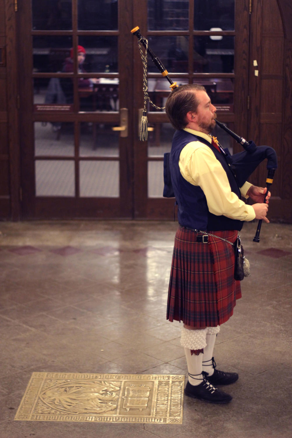 Steve Moore begins playing bagpipes to open one of the Folk Fest concert sets. Though this is Steve's first year playing the pipes for the Festival, the tradition of a bagpiper starting each show goes back to the very first Festival in 1961.