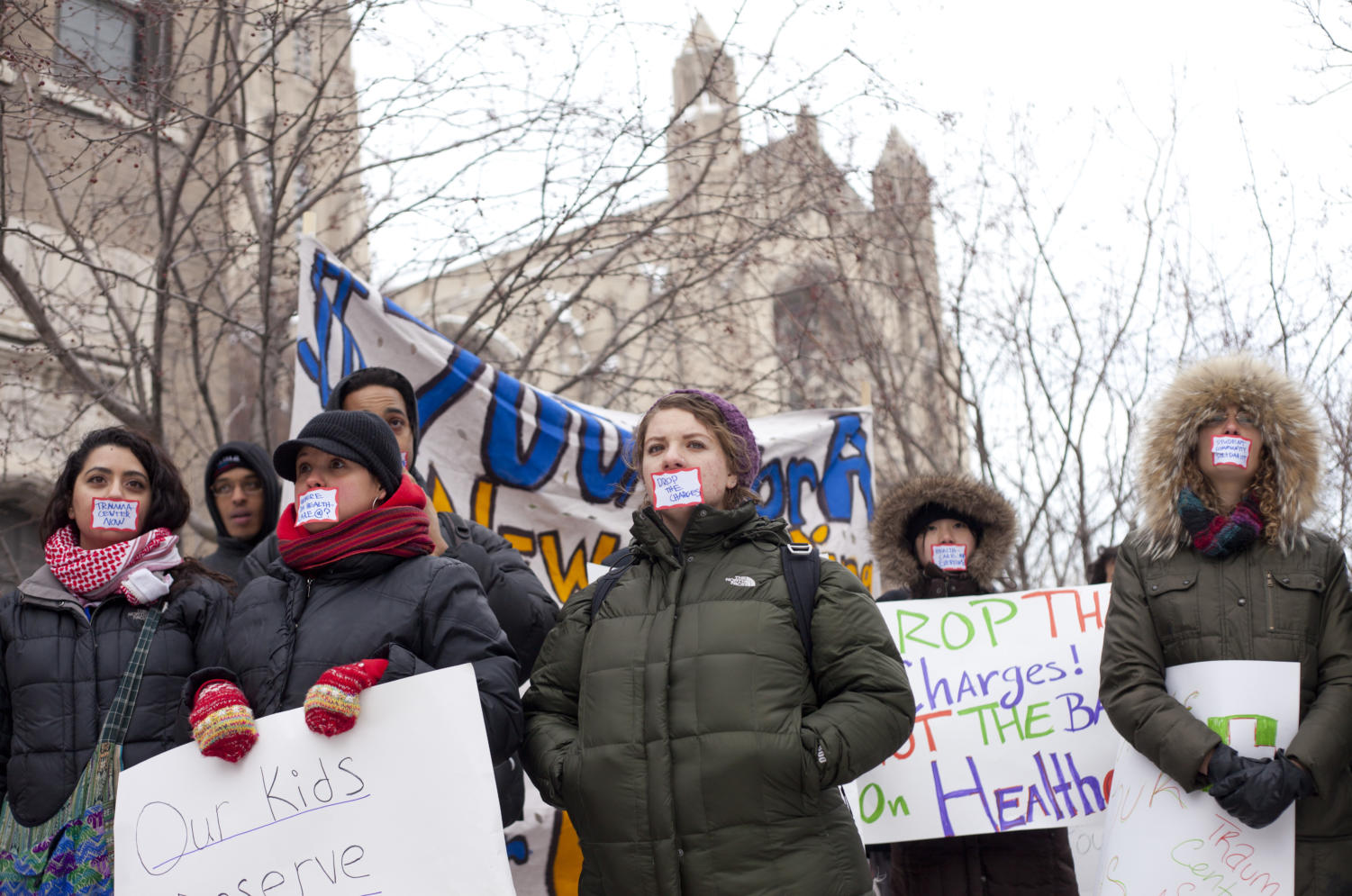 In response to the opening of the UCMC's new Center for Care and Discovery, students and communitee members from Southsiders Together for Organizing Power (STOP) and Fearless Leading by the Youth (FLY) prostest outside President Zimmer's house on Saturday afternoon, and call for the demands on their petition to be answered by the University.