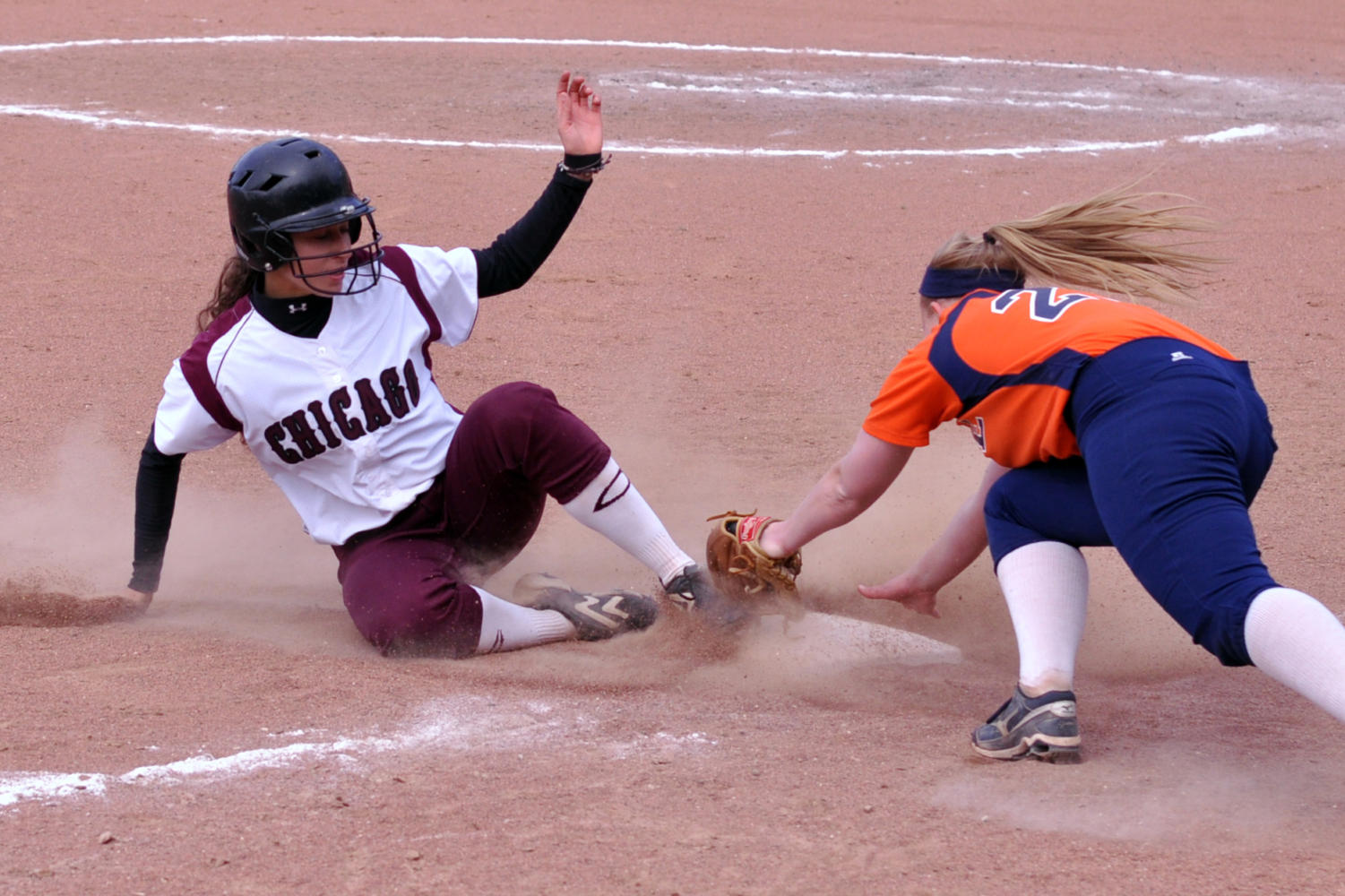 Junior Kaitlyn Carpenter slides to third base in a game against the Hope College Flying Dutch earlier last year.