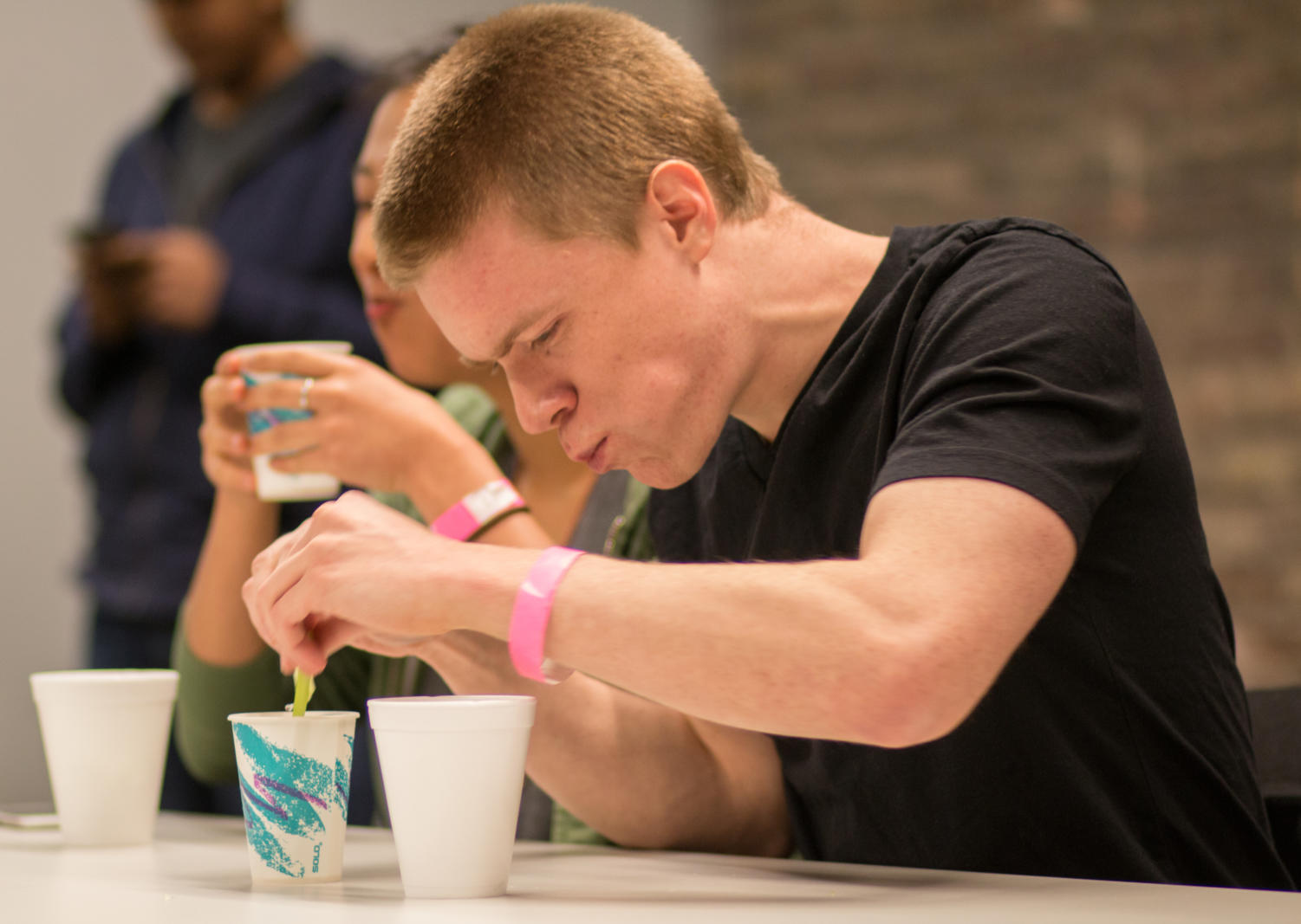 Participants in Uncommon Hacks compete in a celery-eating contest.