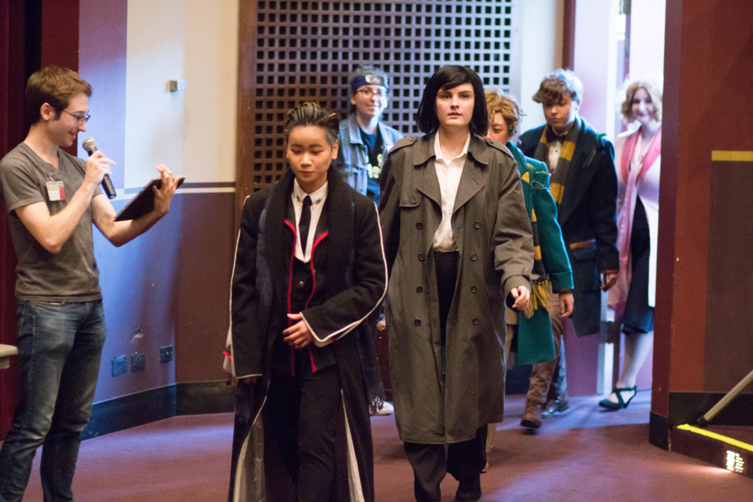 The Fantastic Beasts group cosplay enters the competition hall. They won best group in the cosplay contest.