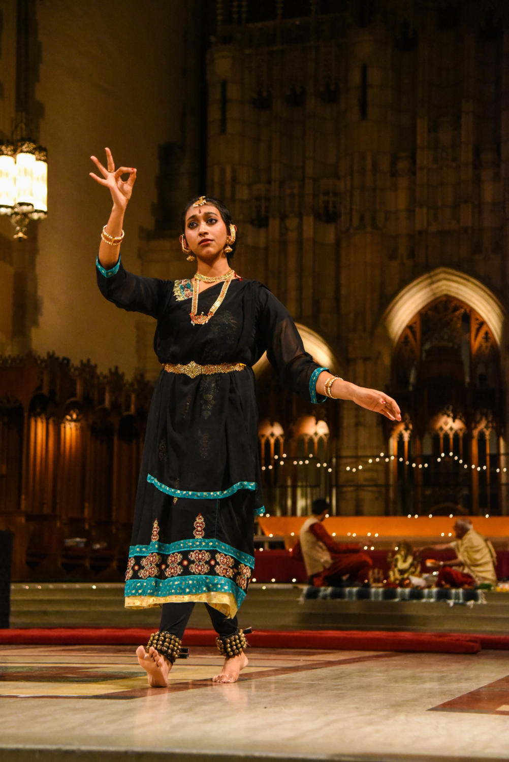 A student performs at a Diwali celebration in Rockefeller chapel.