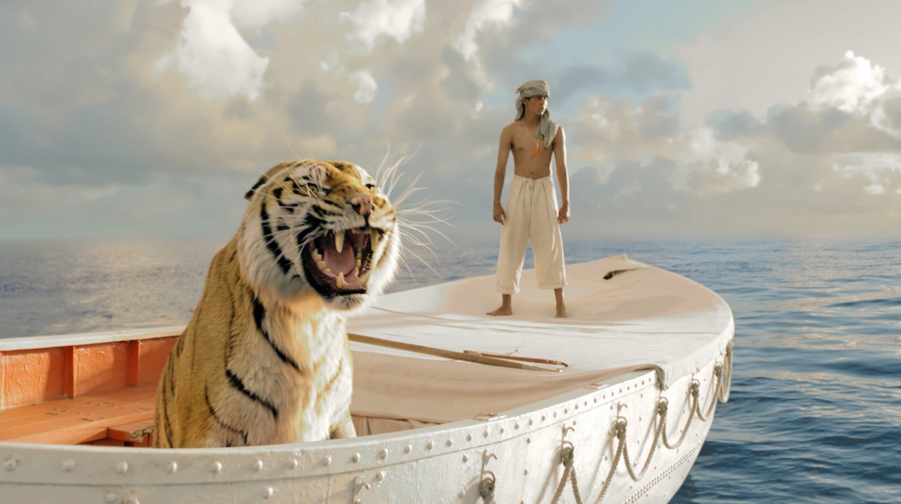 Pi Patel (Suraj Sharma) and a Bengal tiger that, thanks to CGI, looks more real than a real tiger. The two must rely on each other to survive in an epic raft journey in Ang Lee’s adaptation of Life of Pi. 