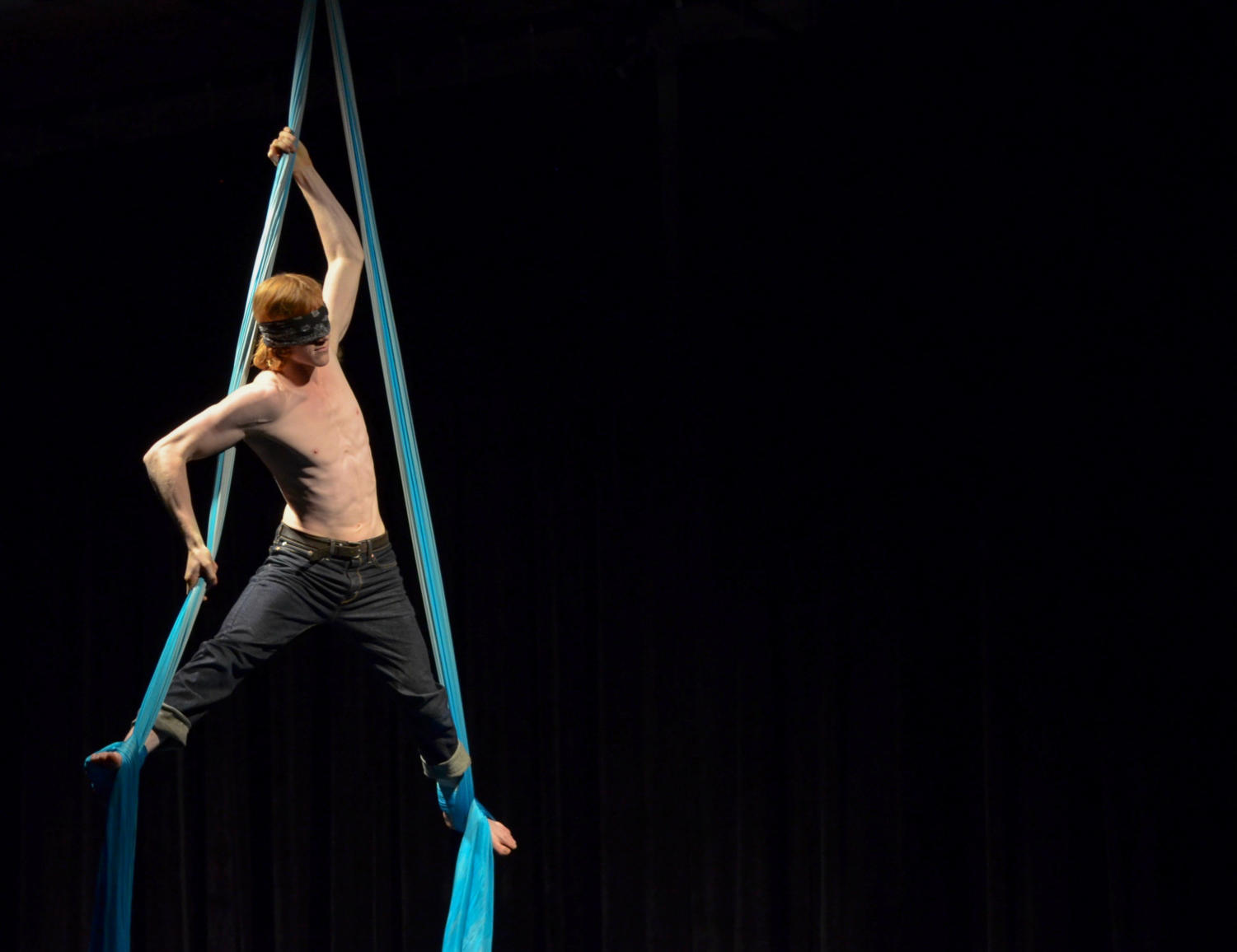 Third-year Daniel Heins performs a silks act while blindfolded.