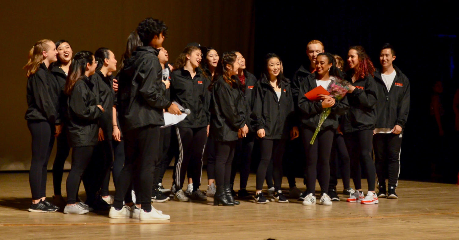 Members of PhiNix, UChicago’s hip-hop dance crew, present third-year Hannah Jacobs-El with flowers for her birthday.