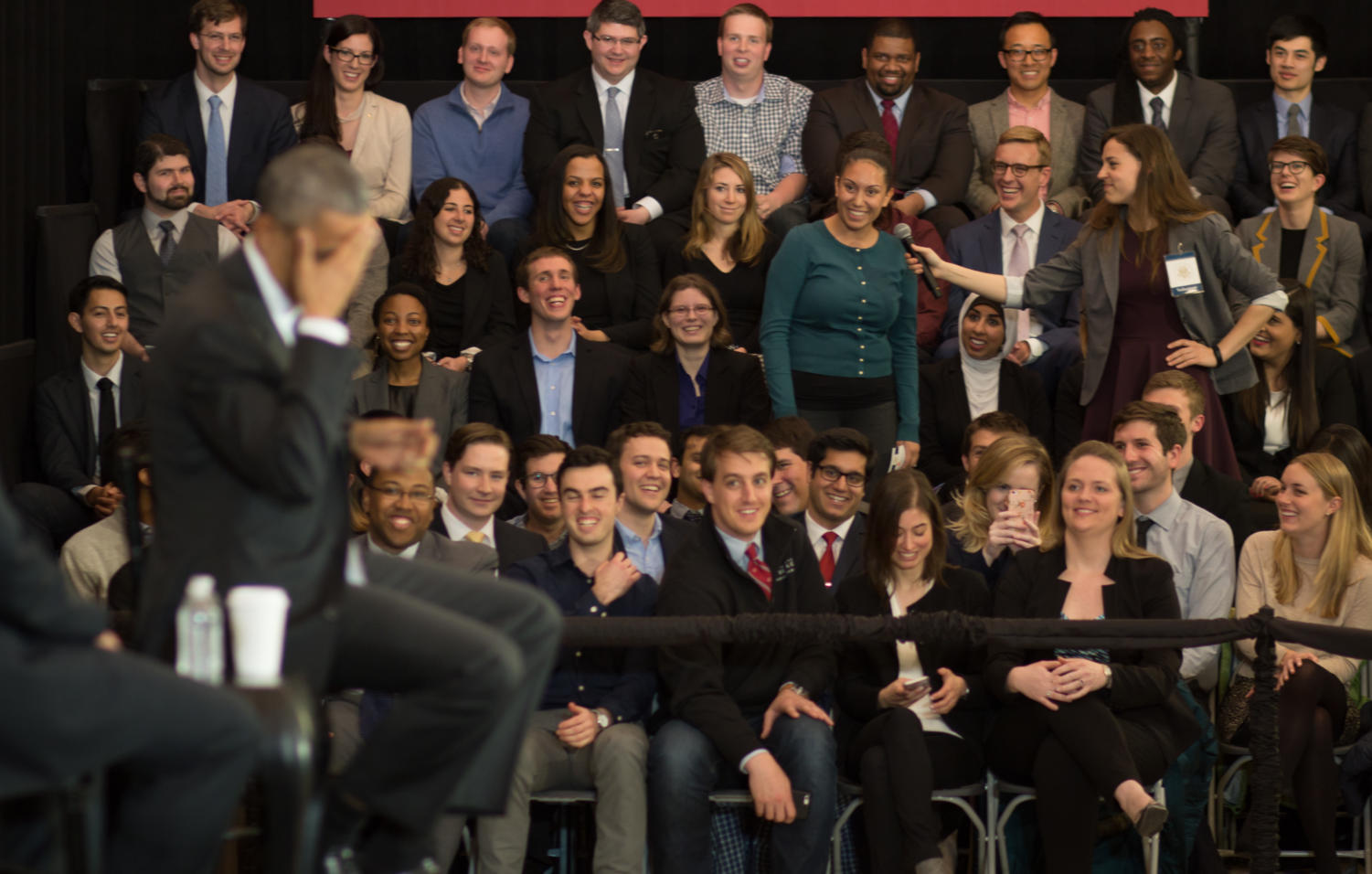 President Obama jokes with a Law School student who asked him a question.