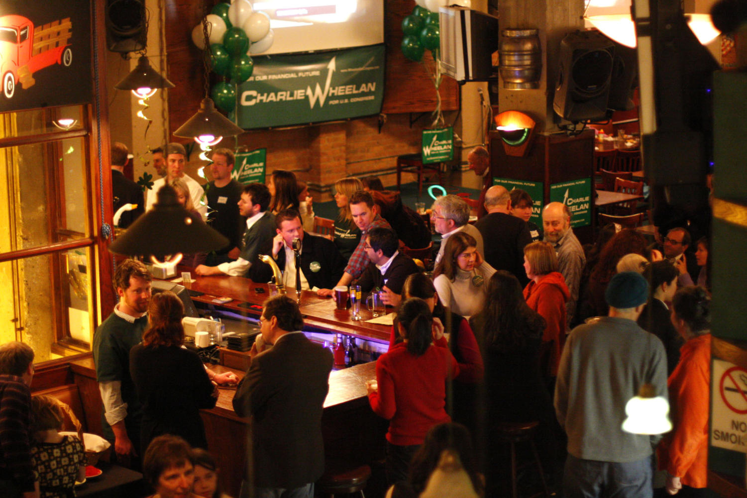 Supporters of Charles Wheelan, professor at the Harris School of Public Policy, gather on the night of the Democratic primary at the Goose Island Brewery in Wrigleyville.