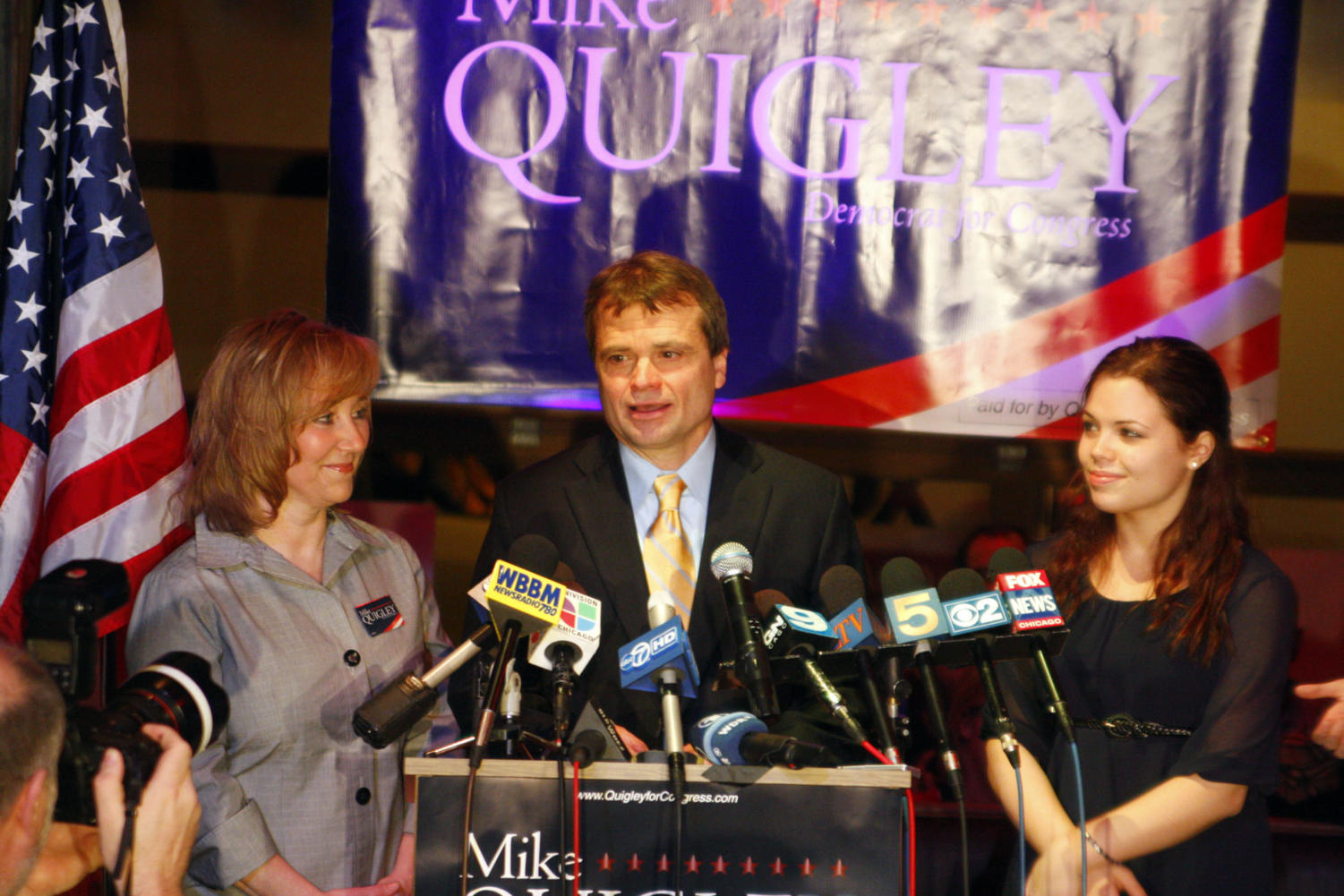 Mike Quigley delivers his victory speech for Illinois's 5th Congressional District Democratic primary, alongside his wife, Barbara, and daughter Meghan,Tuesday night at the Red Ivy bar and restaurant in Wrigleyville. He is an alumnus of the Harris School of Public Policy.