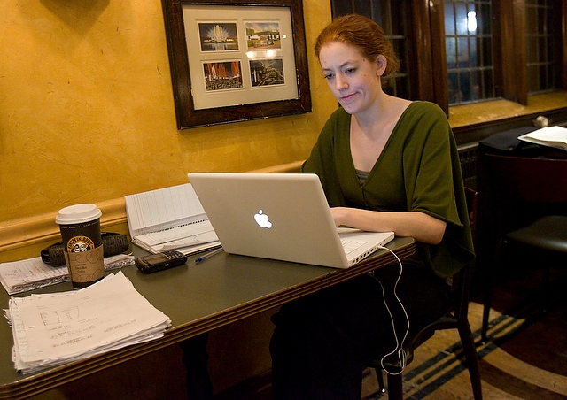 Sydney Ahearn, A.B. '08 and a Teach for America corps member, grades papers in the C-Shop.