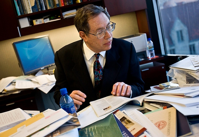 University of Chicago Law School professor Richard Epstein poses at his desk in his office at the Law School.