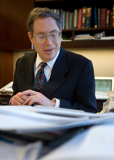 University of Chicago Law School professor Richard Epstein poses at his desk in his office at the Law School.