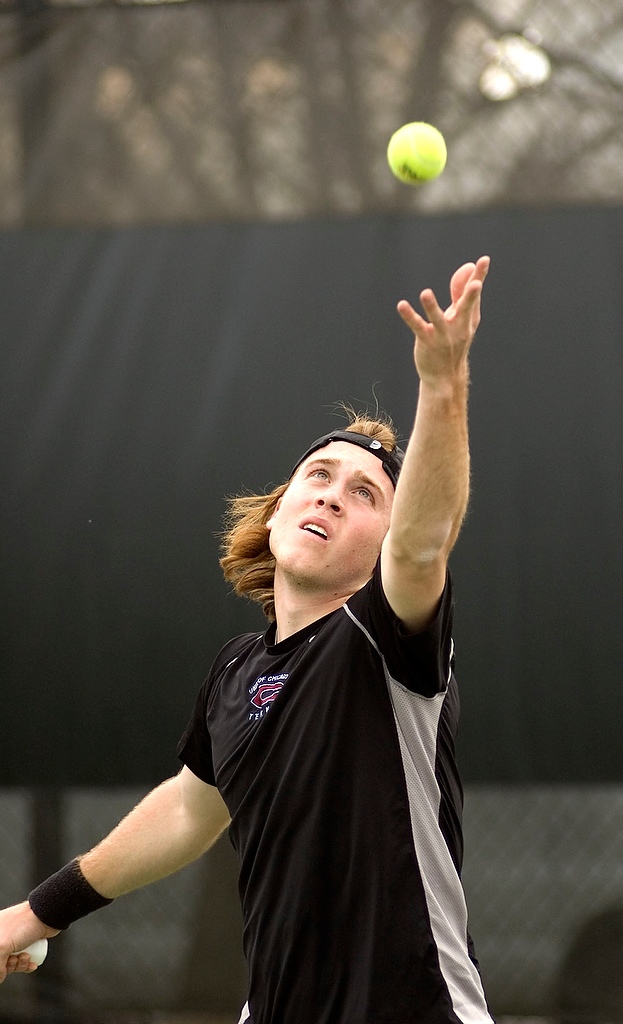 First-year Troy Brinker begins to serve in his match against Lake Forest at Stagg courts this Wednesday.