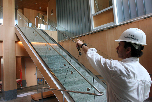 Senior Tech II Project Manager Daniel Albo give a tour of the newly renovated Searle Chemistry Laboratory lobby.