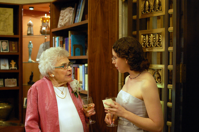 The guest of honor, Rita Picken (left), chats with the Oriental Institute's Membership Program Manager, Sarah Sapperstein (right) at Wednesday's 90th Jubilee celebration at the Oriental Institute.