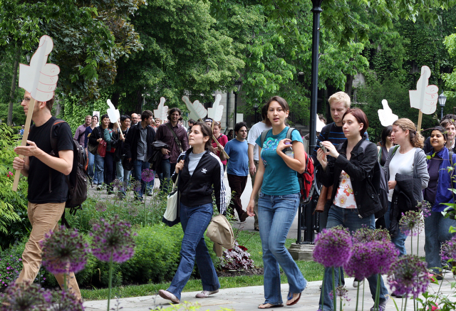 Students march towards the Administration building during a Graduate Students United protest over University policies on contracts and teaching job availability.