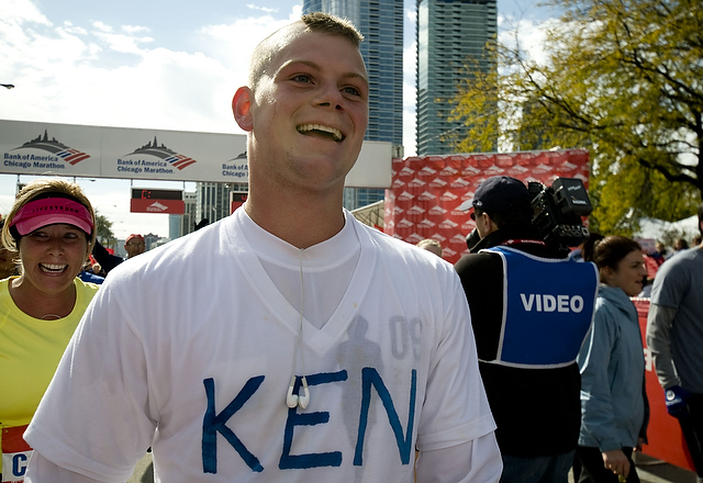 A runner smiles after completing the 26.2 miles of the Chicago Marathon on October 11.