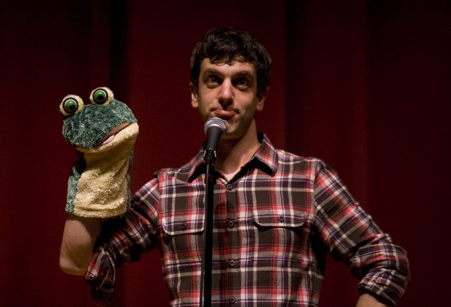 B.J. Novak, comedian and writer for The Office, models for cameras in the crowd with Shy Puppet, his quiet companion. The performance took place last Saturday in Mandel Hall.