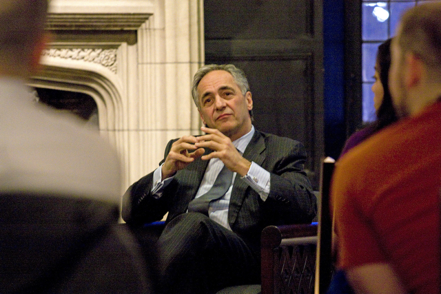 President Zimmer sitting in the McCormick Tribune Lounge listening to a students' question at the Quarterly Open Student Meeting with President Zimmer and Vice President Kimberly Goff-Crews on Tuesday in McCormick Lounge.