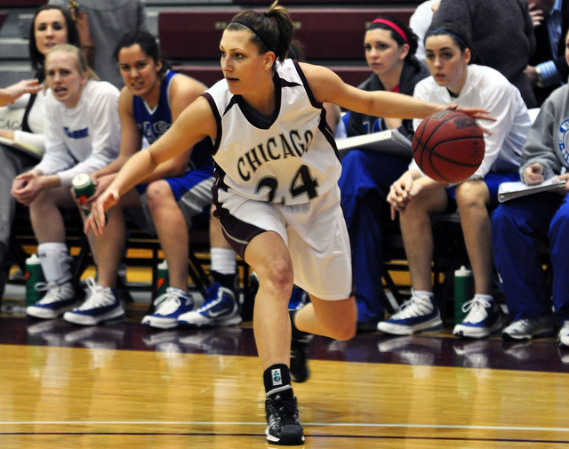 Second-year guard Bryanne Halfhill heads toward the basket during the home game against Case on Sunday. The game resulted in a 58-57 victory for the Maroons.