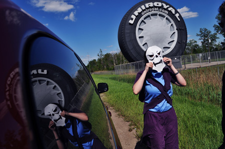 Third-year Christina Daly, dressed as Skeletor, prepares to complete road trip item number 93 for the Max P. Scav team on I-90.
