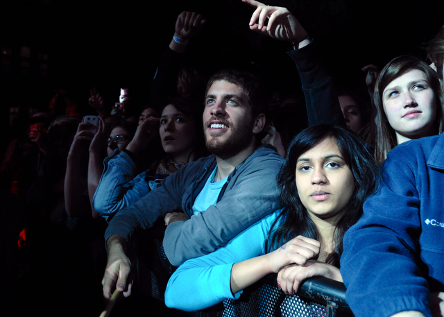 Second-year Sam Bonar (center) and other U of C students watch Nas and Damian Marley perform from the pit.
