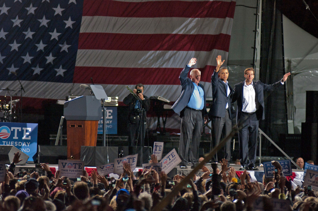 Governor Pat Quinn (left), President Barack Obama (middle) and Senate candidate Alexi Giannoulias (right) greet the crowd at the end of the Democrat rally Saturday evening at the Midway Plaisance.