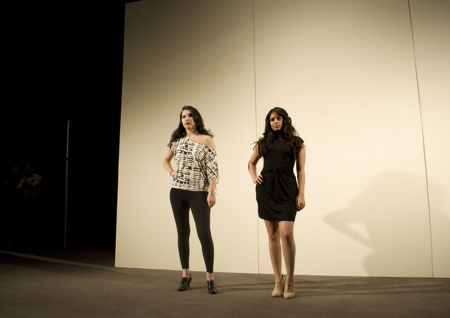 Third-year Alejandra Consuvgra (left) and fourth-year Sarah Ghosh (right) model clothes sold by Kembrel.com.