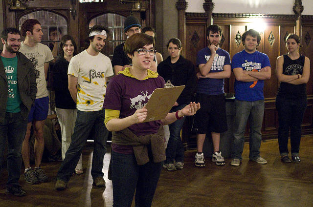 Fourth-year Grace Chapin briefs Scav Hunt participants as the team captains line up behind her.