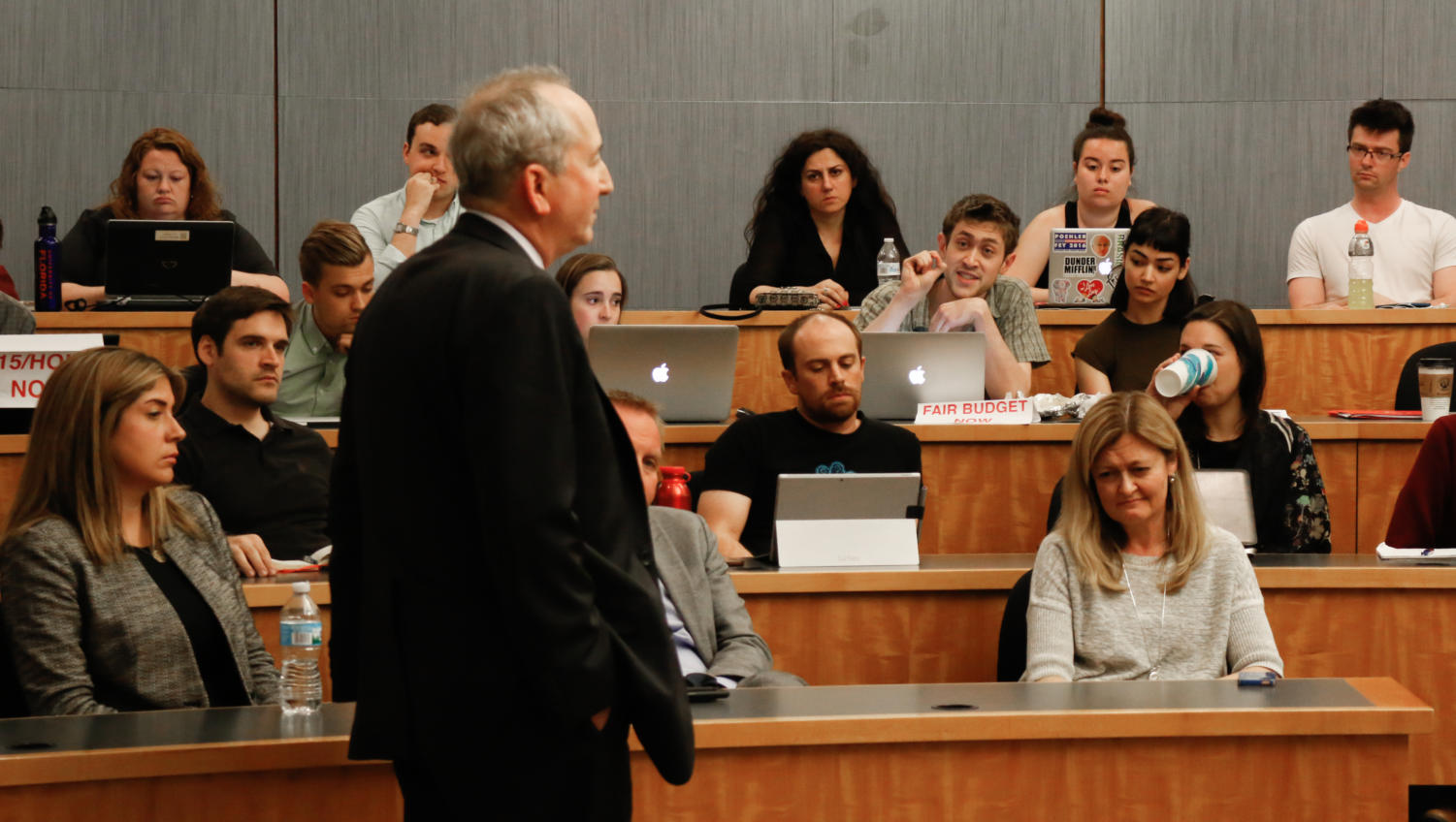 Provost Isaacs responds to a series of questions from the IIRON student network about raising the minimum wage for campus workers and other issues at a Student Assembly meeting on May 23. Zoe Kaiser.