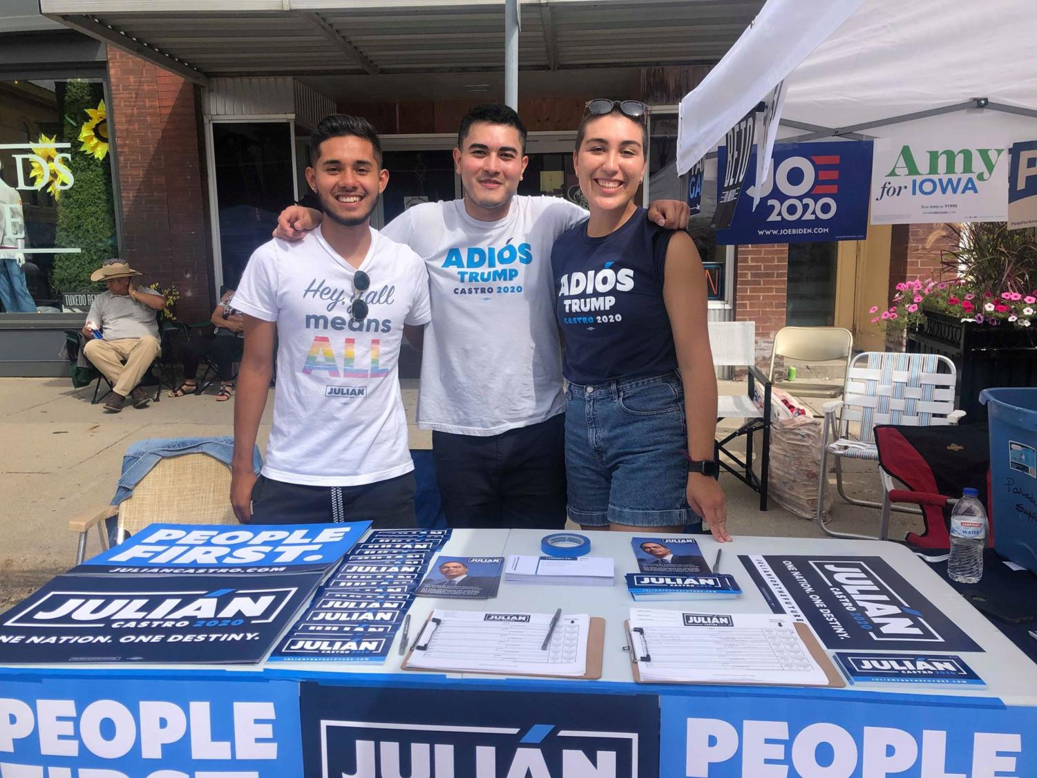 UChicago students Jesse Martinez and Alicia Hurtado pose with another intern, Eliseo Flores, at a Latino festival in Iowa.