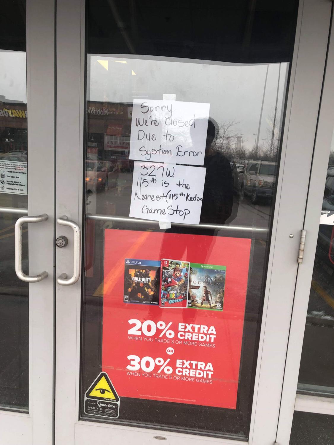 The GameStop at 1700 West 119th Street was robbed at 11:28 a.m. The store was still closed at 1:48 p.m. Officers were seen inside.