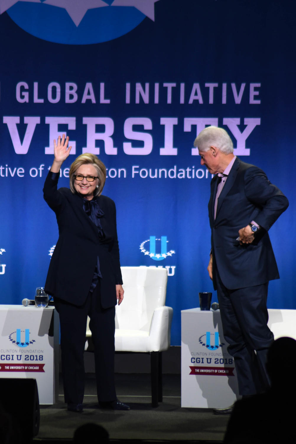 Former secretary of state Hillary Clinton waves to the audience at the closing session of the Clinton Global Initiative University.