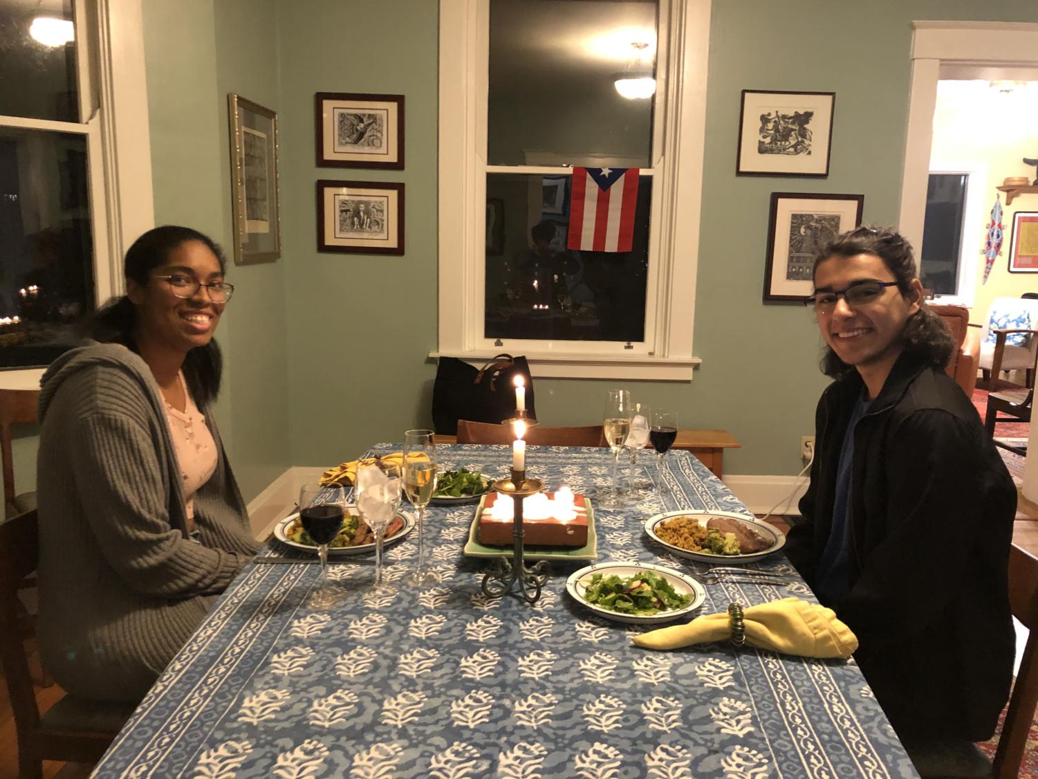 Marcus and I eating dinner made by his dad for our one-year anniversary.