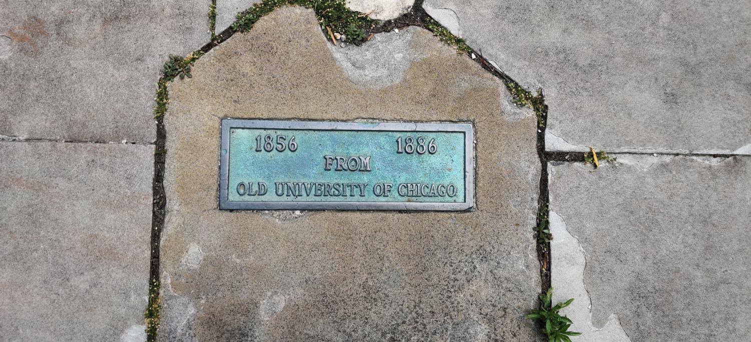 The plaque beneath the stone from Douglas Hall at the Old University of Chicago in the 