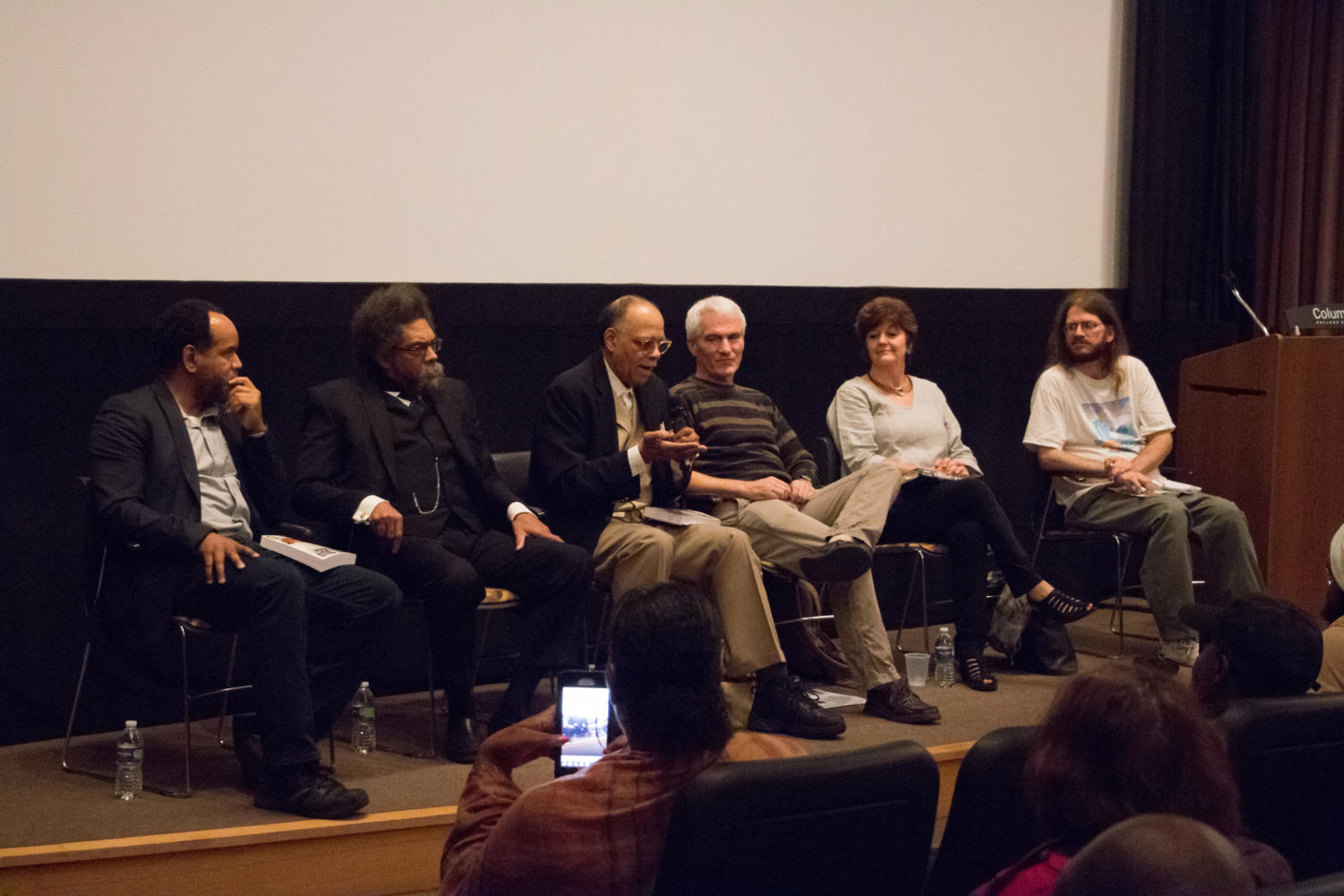 Writers give a panel discussion entitled 