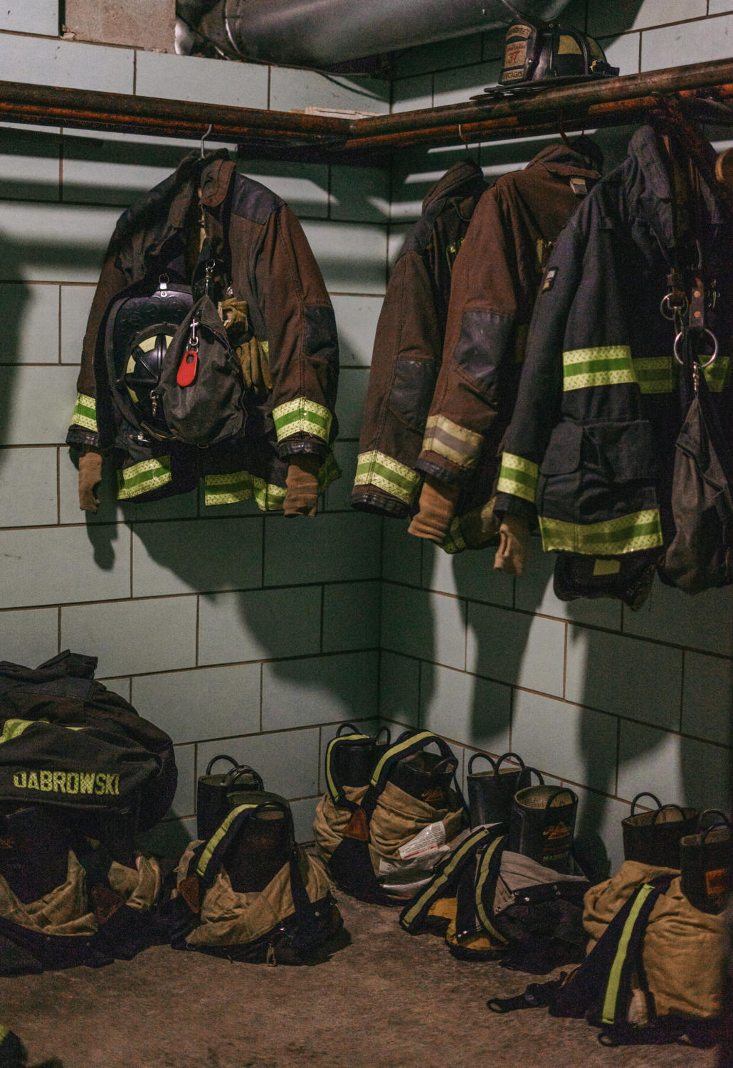 Firefighting apparel stored in one of the communal closet spaces