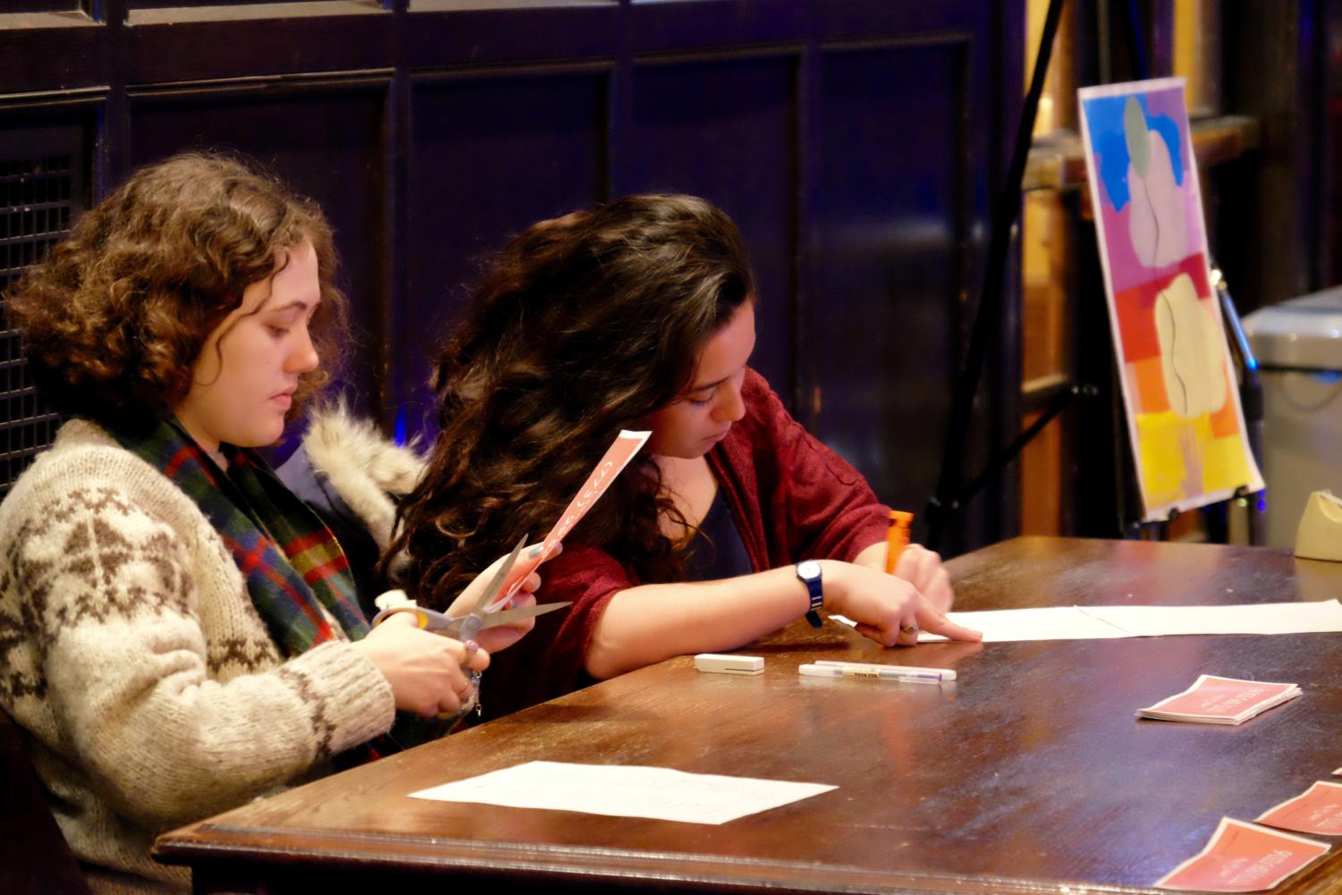 Lean On Me UChicago representatives run a table at Friday's event.