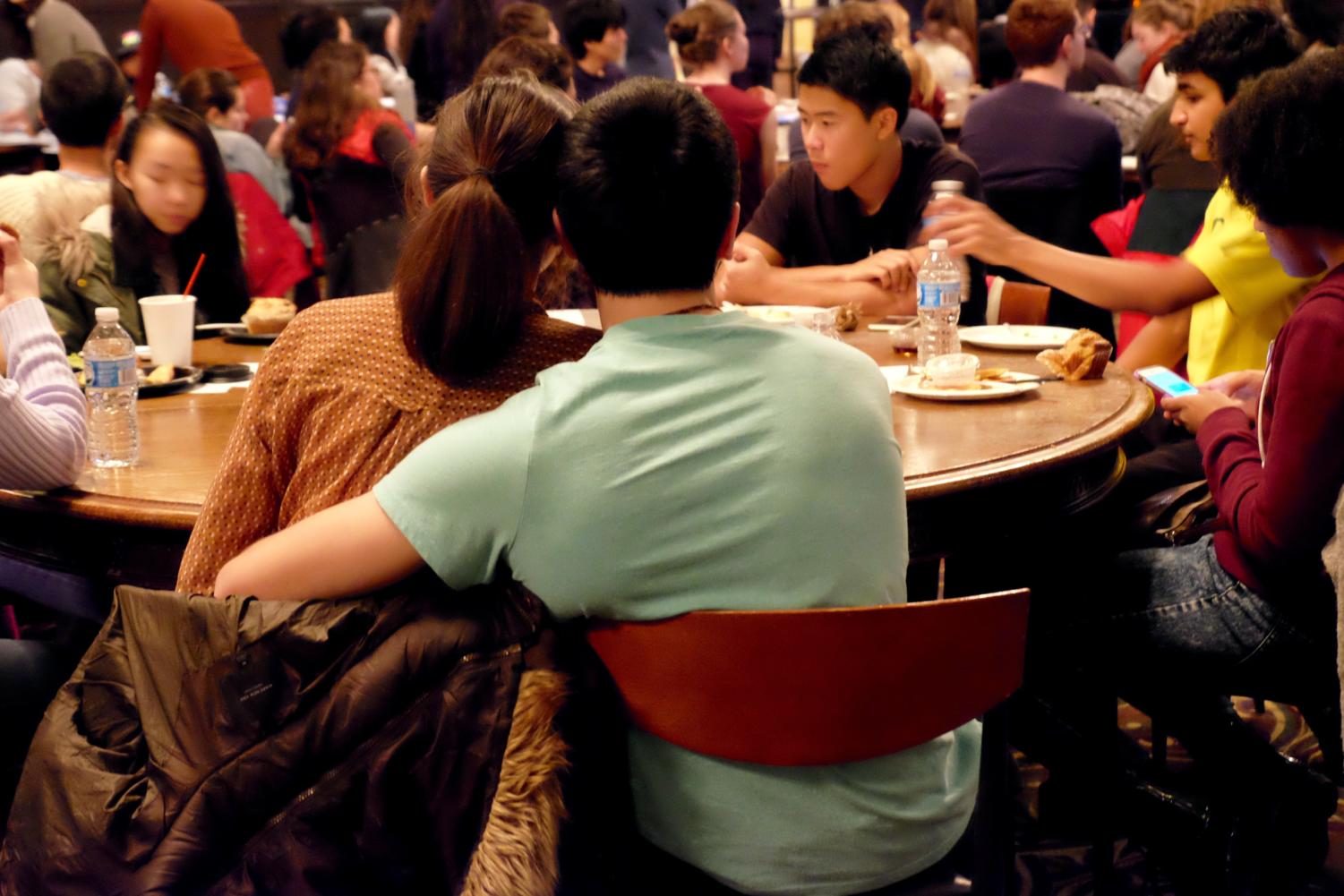 Students watch performances in Hutchinson Commons.