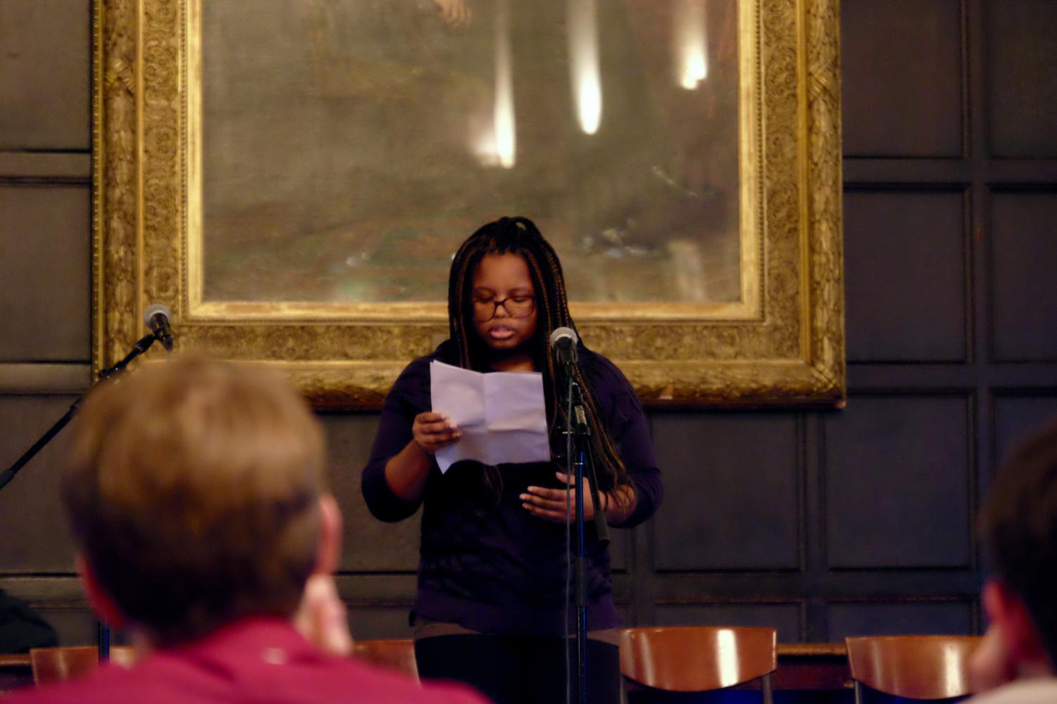 Fourth-year Rachel Harrington reads a poem.