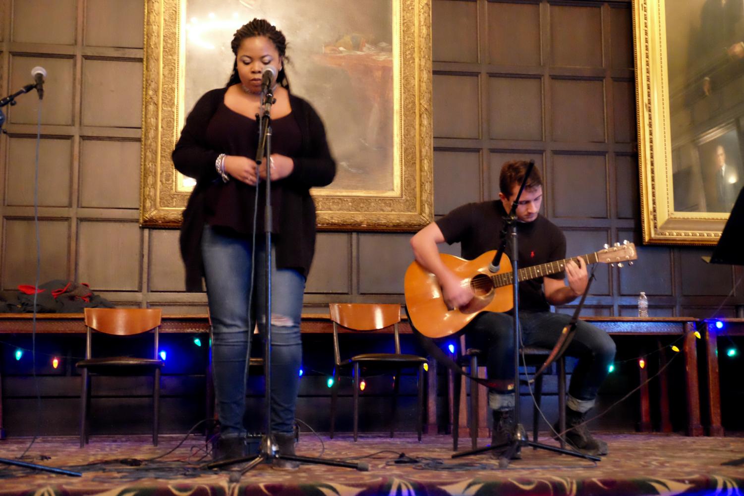 Undergrads Gaby Osirim and Jackson Mariotti perform at See Through Stigma's Arts Coffeehouse.