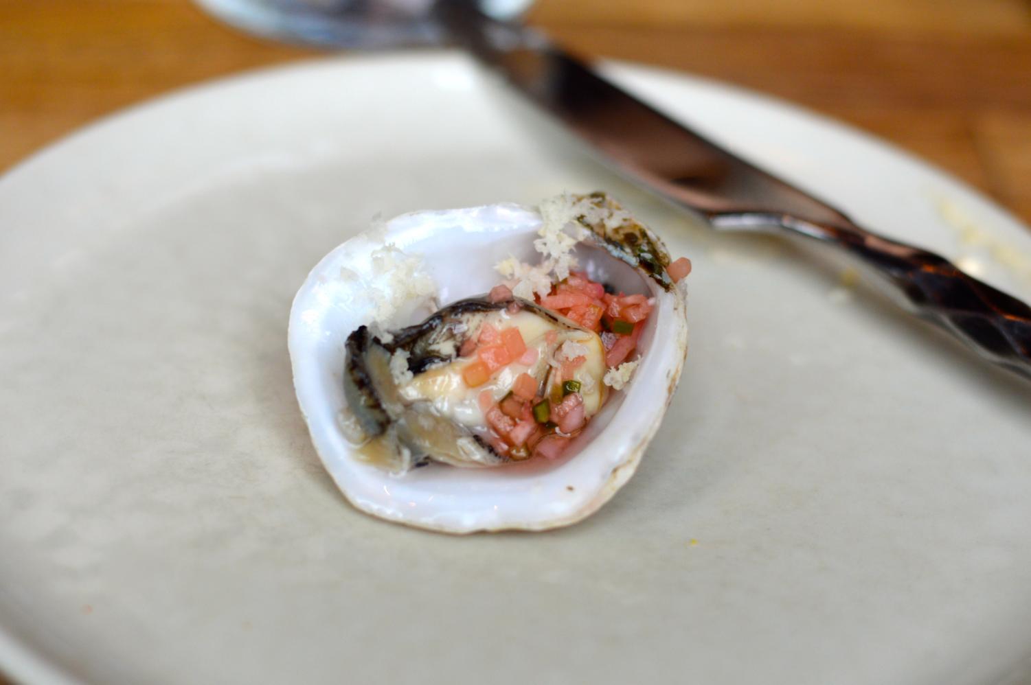 At Girl & the Goat, the oyster is your world. 