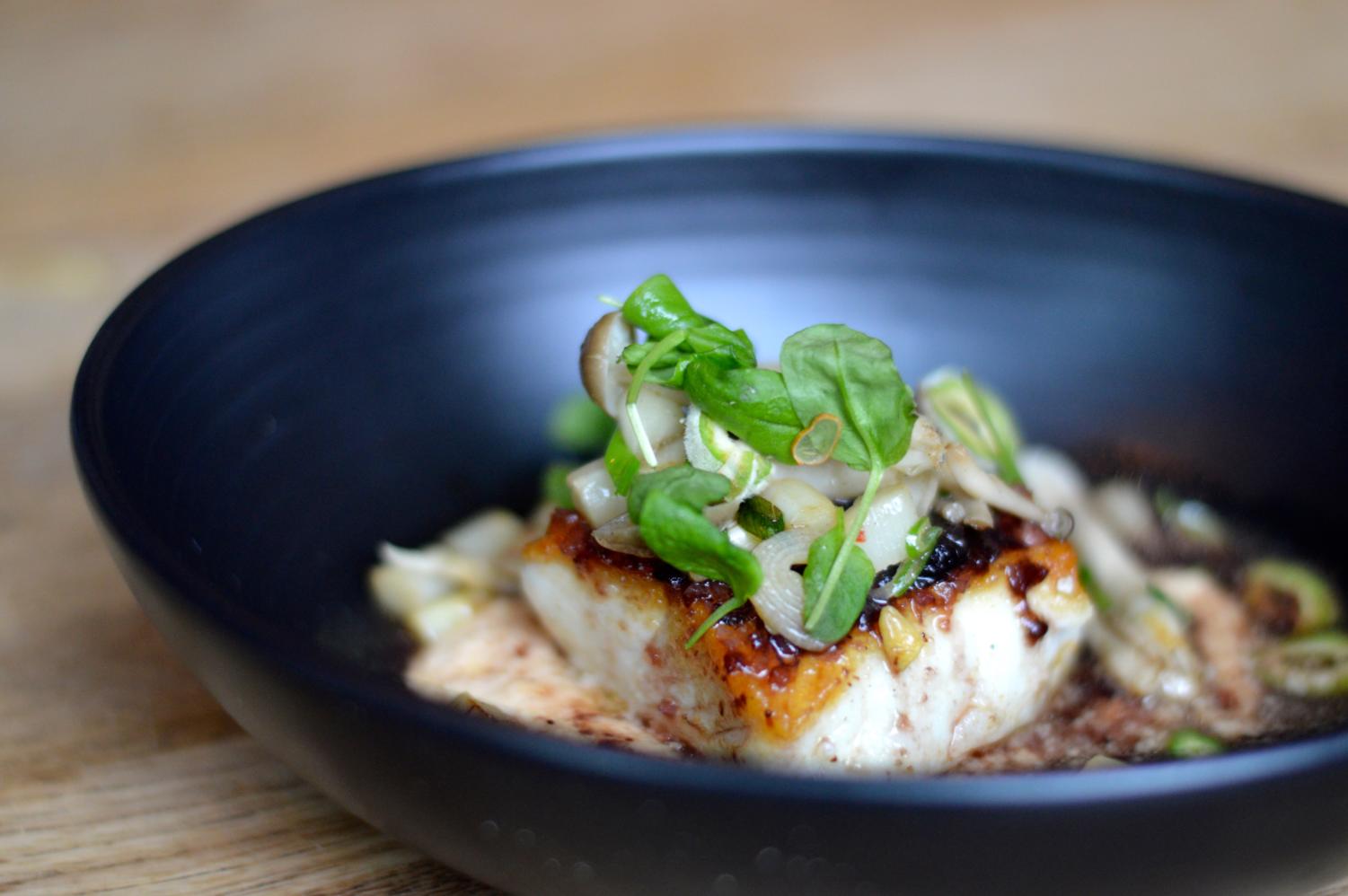 The pan-seared halibut is the dish that secured Izard's first-place finish in Top Chef. 