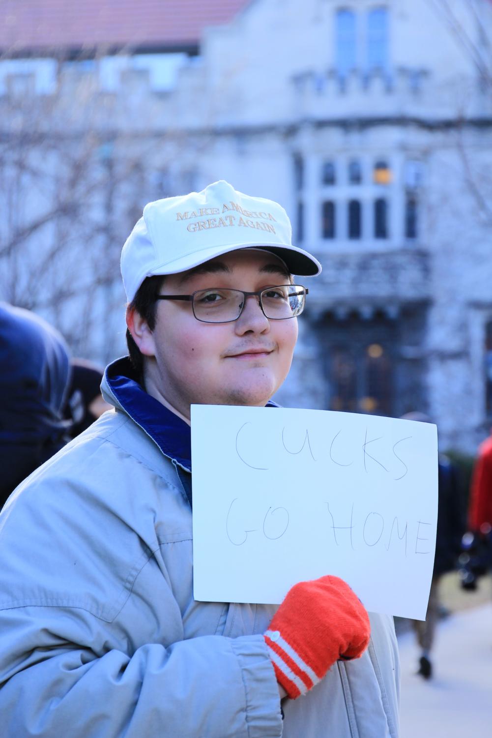 A sole counter-protester, second-year Paul Alves, wore a “Make America Great Again” cap. He stood in front of the Quadrangle Club and waved a sign that said “Cucks go home” at the protesters across the street.