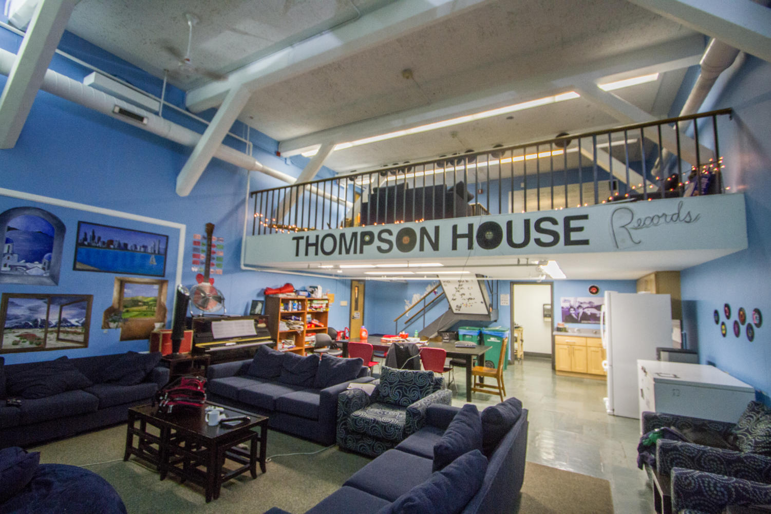 Thompson lounge sliced in two by the installation of a second story.