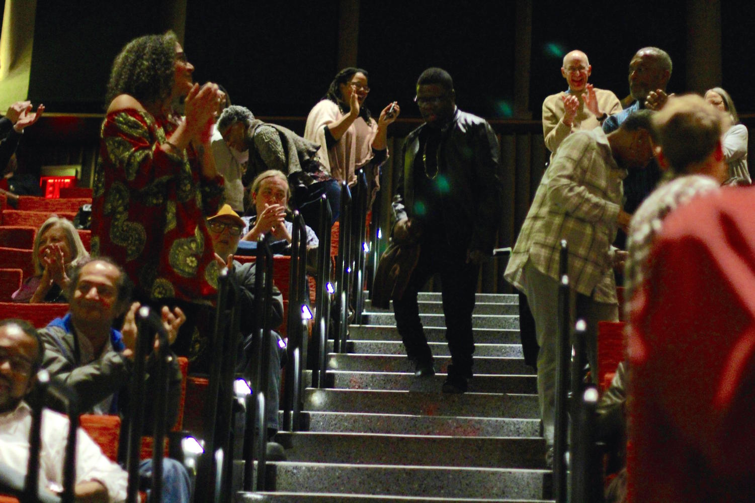 Moving through the hall, avery r. young invited the audience to dance with him for the last song of the night.