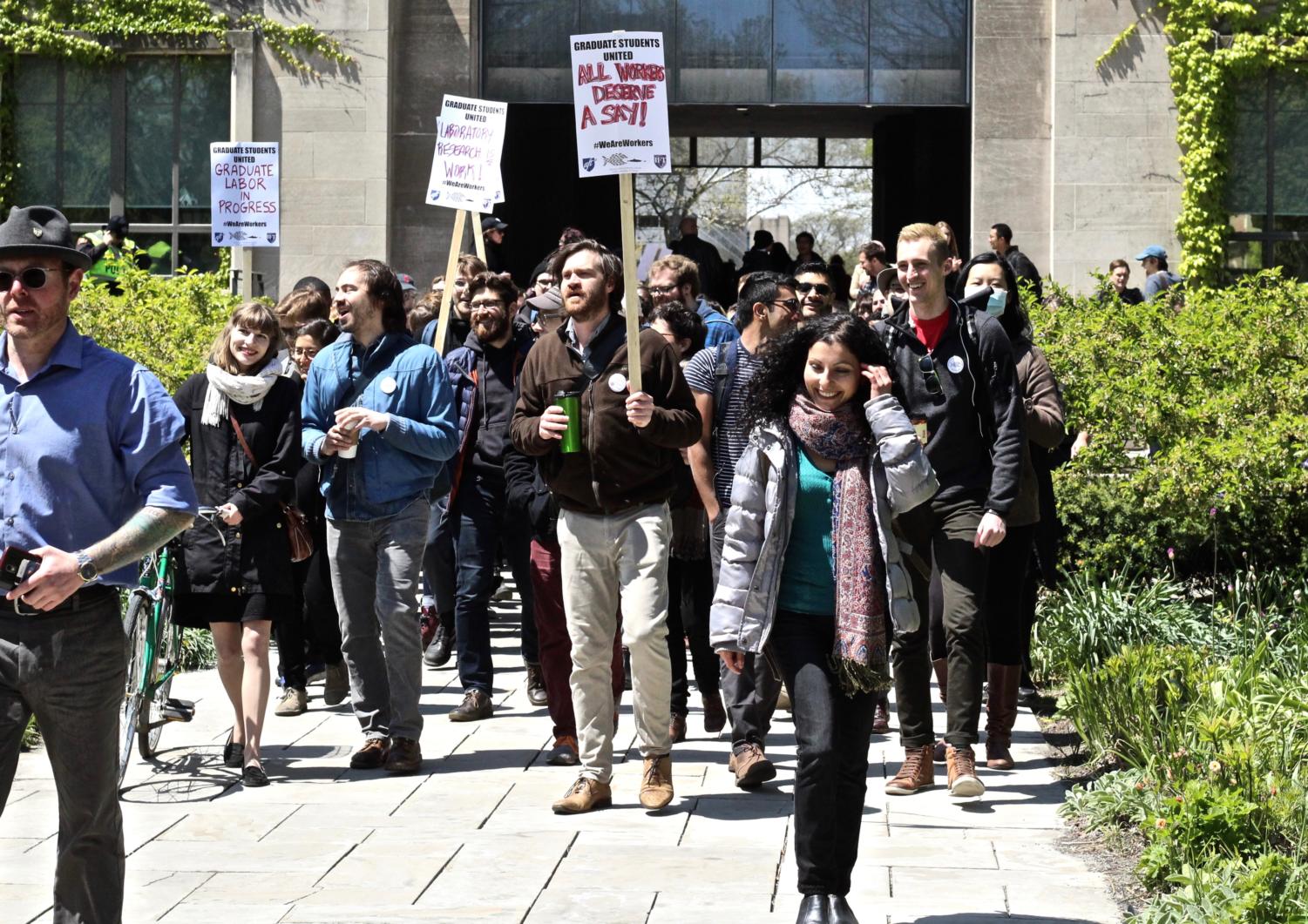 Graduate Students United members rally on the Quad in May 2017.