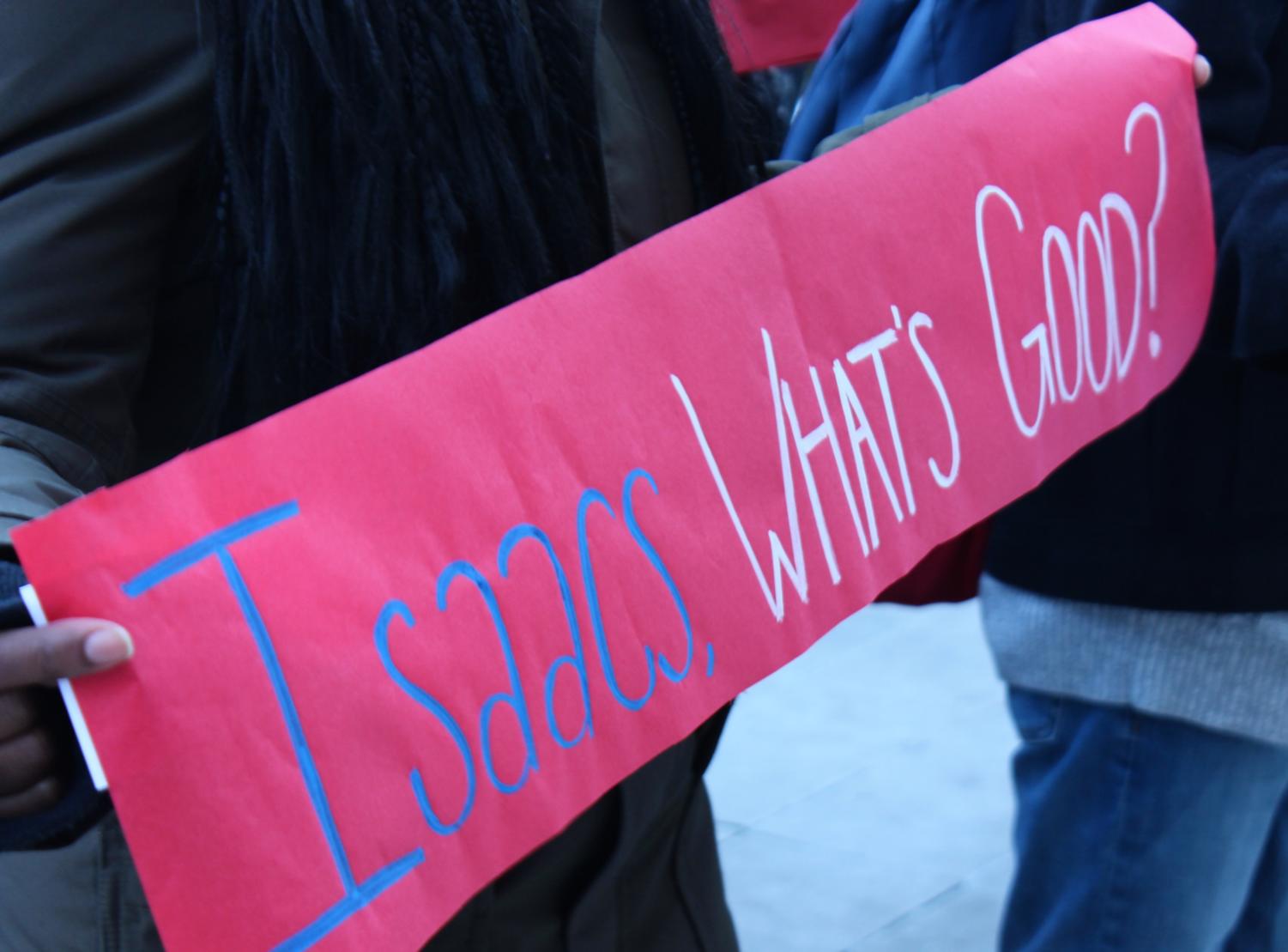 Signs left outside Levi Hall after the march. 